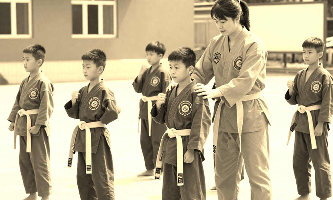 The Rhythm of the Fighter Standing In Between: A Vietnamese Man's Fateful Touch on an Asian Stage The Rhythm of the Fighter Standing In Between: A Vietnamese Man's Fateful Touch on an Asian Stage